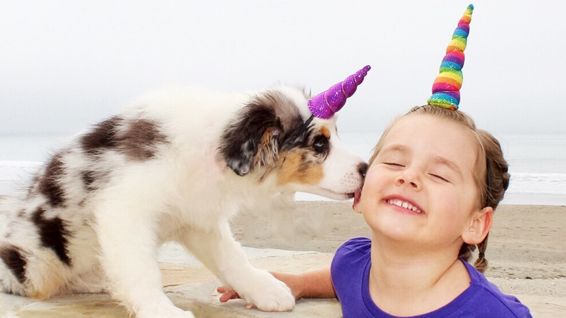 Unicorn horn on girl and puppy